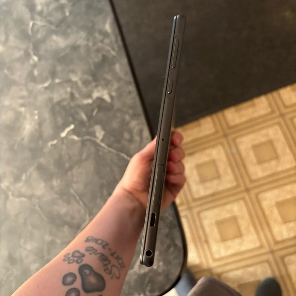 Black Tablet with Blue Screen